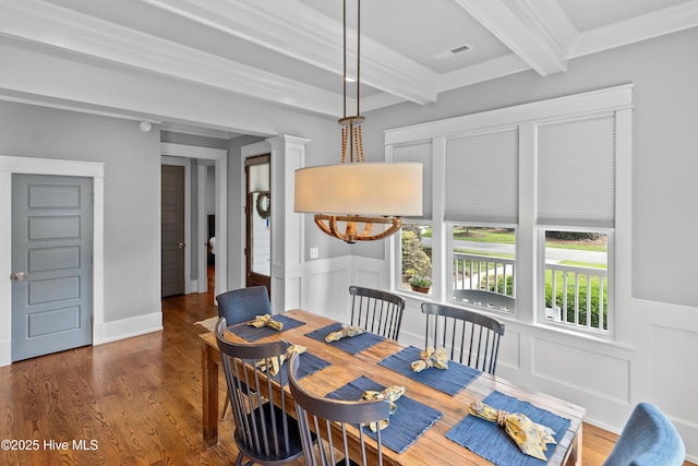 212 Cornubia Dr, Castle Hayne, NC 28429 - dining space featuring beamed ceiling, wood finished floors, and a wainscoted wall