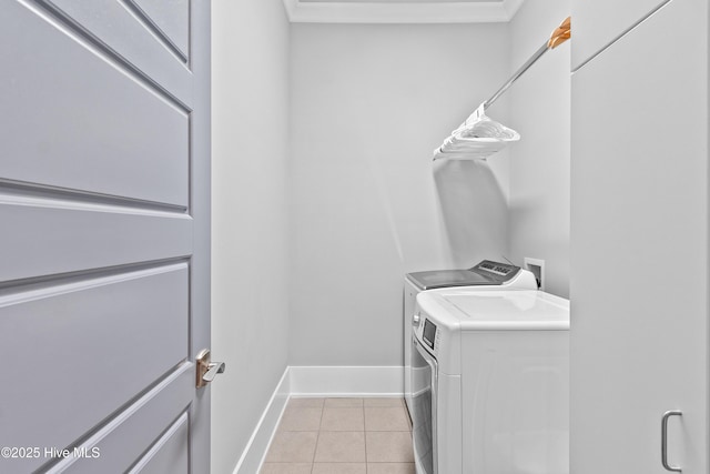 212 Cornubia Dr, Castle Hayne, NC 28429 - laundry room featuring washer and clothes dryer and light tile patterned floors