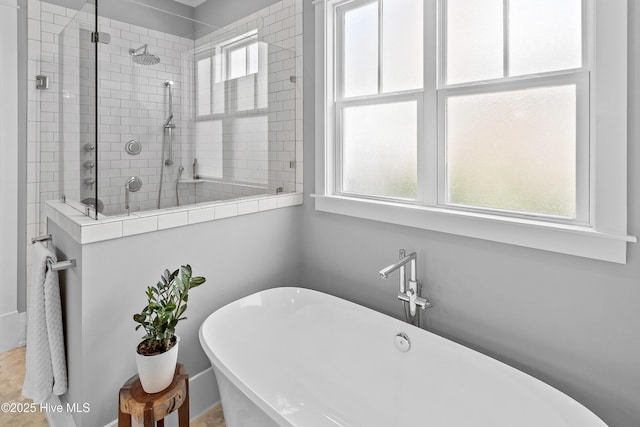 212 Cornubia Dr, Castle Hayne, NC 28429 - bathroom with a freestanding bath and a tile shower