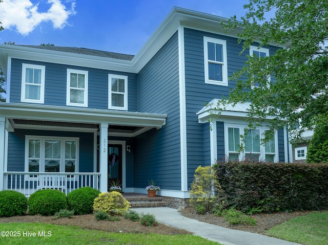 212 Cornubia Dr, Castle Hayne, NC 28429 - traditional-style home with covered porch