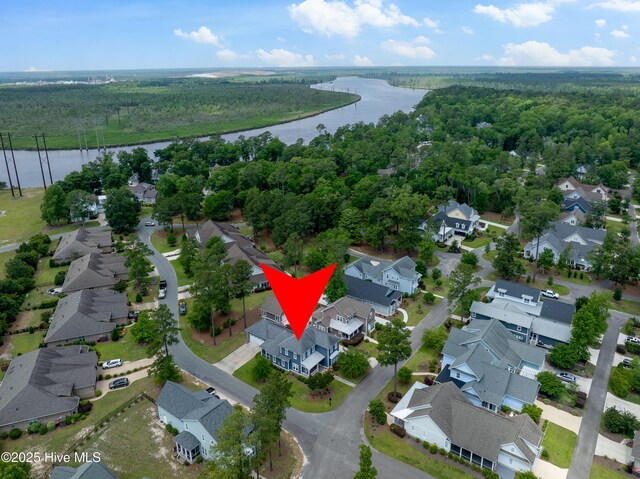 212 Cornubia Dr, Castle Hayne, NC 28429 - aerial perspective of suburban area featuring a large body of water