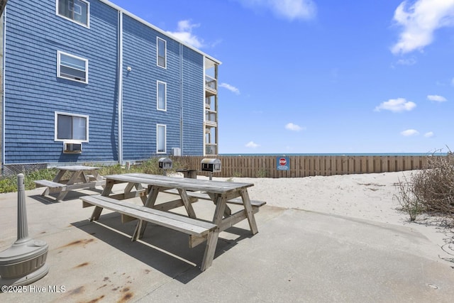 view of patio / terrace with outdoor dining space, area for grilling, and fence