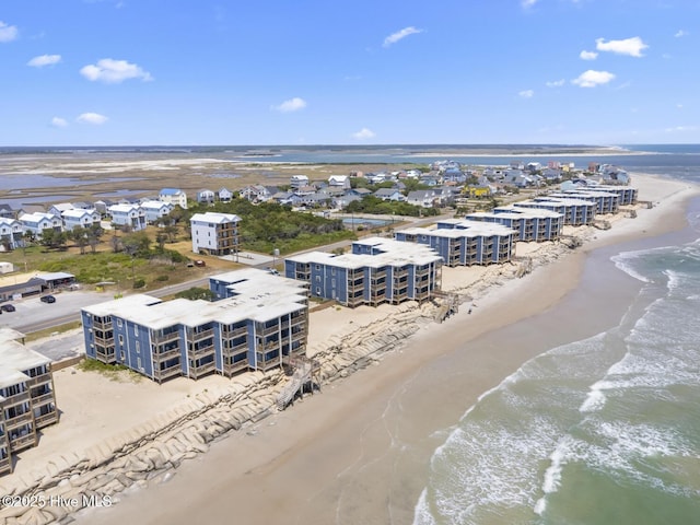 aerial view of extended coastline and apartment complex / building
