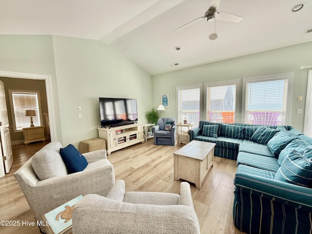 4388 Island Dr, North Topsail Beach, NC 28460 - living room with vaulted ceiling, light wood-style flooring, and ceiling fan