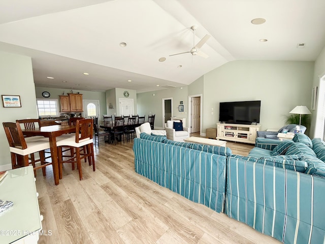 4388 Island Dr, North Topsail Beach, NC 28460 - living room with vaulted ceiling, light wood finished floors, a ceiling fan, and recessed lighting