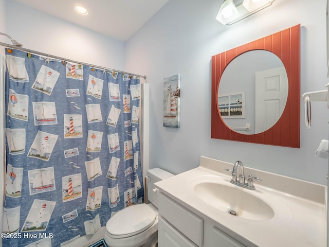 4388 Island Dr, North Topsail Beach, NC 28460 - full bathroom featuring toilet, vanity, and a shower with curtain