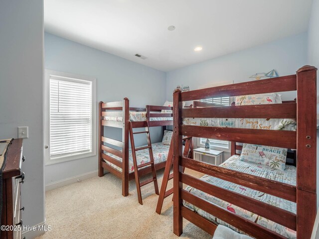 4388 Island Dr, North Topsail Beach, NC 28460 - carpeted bedroom featuring baseboards