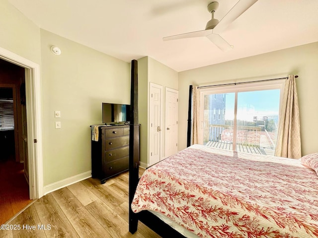 4388 Island Dr, North Topsail Beach, NC 28460 - bedroom featuring light wood-style flooring, access to exterior, baseboards, and a ceiling fan