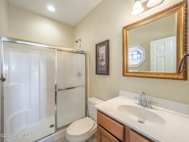 4388 Island Dr, North Topsail Beach, NC 28460 - full bath featuring a shower stall, toilet, and vanity