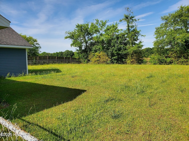 view of yard featuring fence