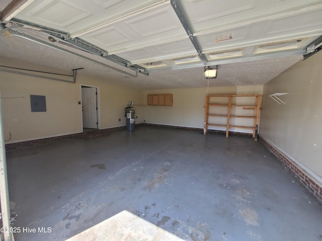 garage with electric water heater, electric panel, a garage door opener, and baseboards