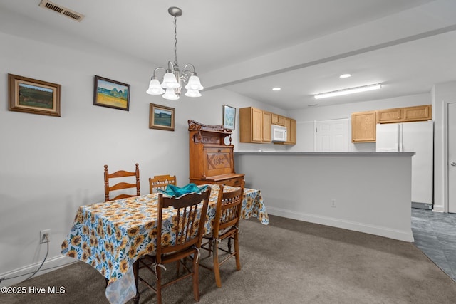 dining space with recessed lighting, a chandelier, baseboards, and dark carpet