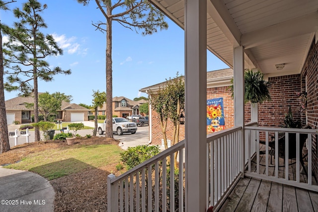 balcony featuring a residential view