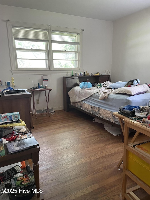 bedroom featuring light wood-type flooring