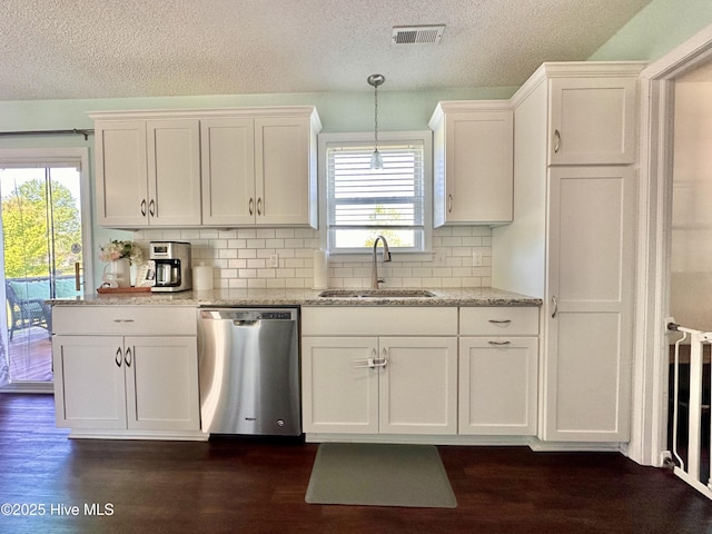 207 Rhonda Rd, Elizabeth City, NC 27909 - kitchen featuring dishwasher, a sink, white cabinets, plenty of natural light, and a textured ceiling