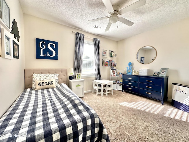 207 Rhonda Rd, Elizabeth City, NC 27909 - carpeted bedroom featuring a textured ceiling and a ceiling fan