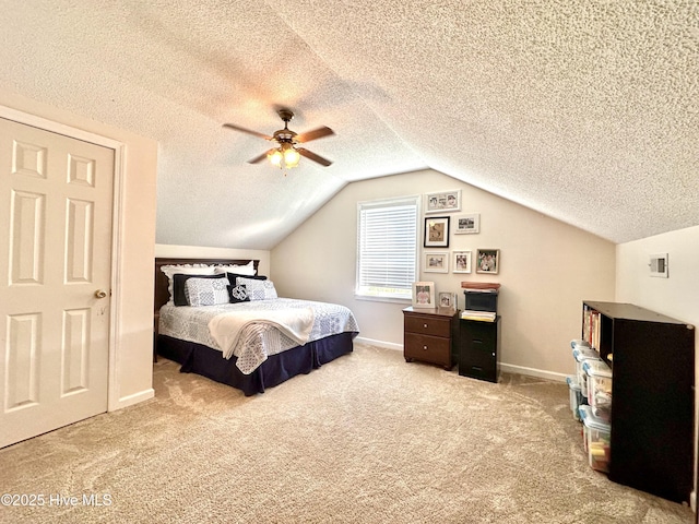 207 Rhonda Rd, Elizabeth City, NC 27909 - bedroom featuring carpet flooring, a textured ceiling, lofted ceiling, ceiling fan, and baseboards
