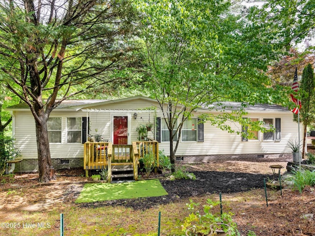366 Ampersand Rd, Aberdeen, NC 28315 - view of front of property featuring crawl space and a wooden deck