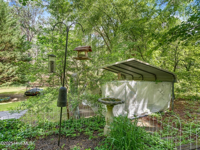 366 Ampersand Rd, Aberdeen, NC 28315 - view of yard with a carport