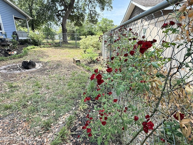 3306 E Oak Island Dr, Oak Island, NC 28465 - view of yard with fence