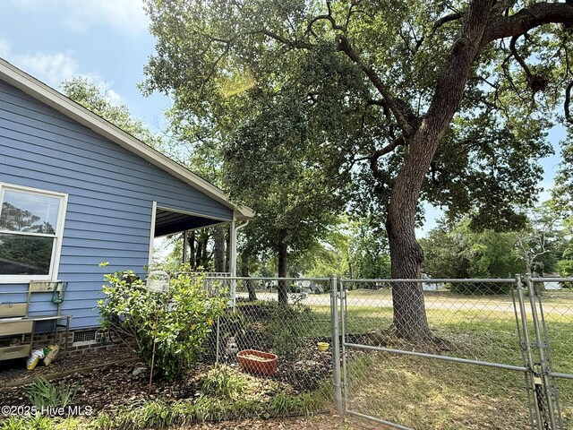 3306 E Oak Island Dr, Oak Island, NC 28465 - view of yard with fence