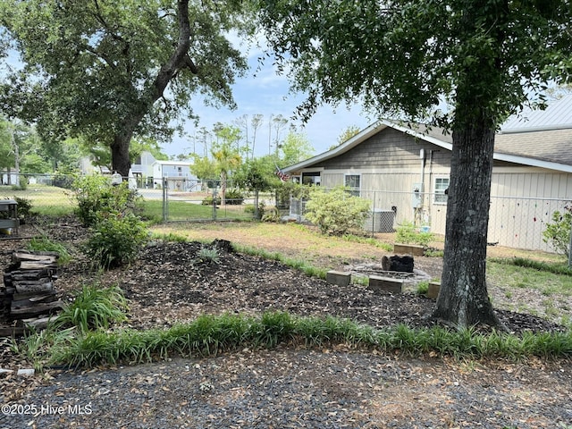 3306 E Oak Island Dr, Oak Island, NC 28465 - view of yard featuring fence