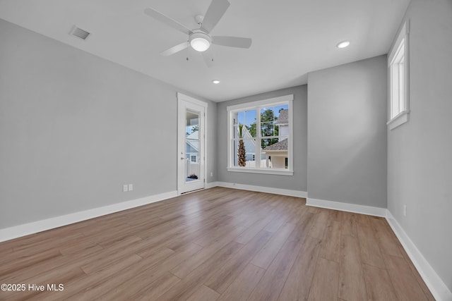 1961 Indigo Cove Way, Calabash, NC 28467 - empty room with wood finished floors, a ceiling fan, baseboards, and recessed lighting