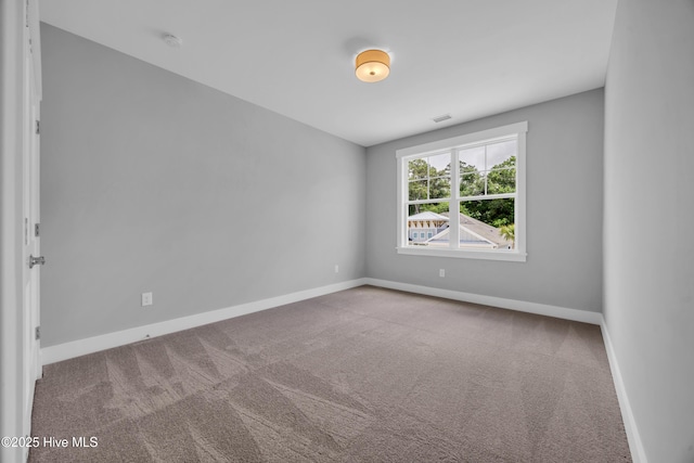 1961 Indigo Cove Way, Calabash, NC 28467 - carpeted empty room featuring baseboards and a smoke detector