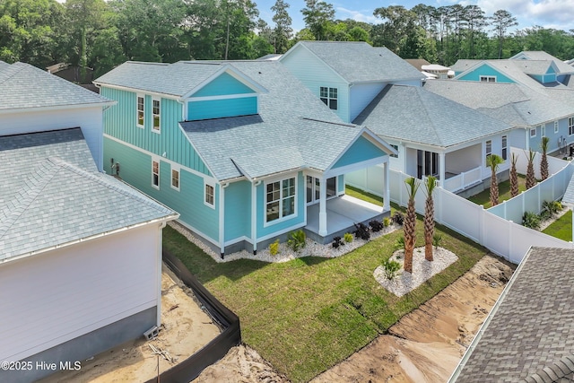1961 Indigo Cove Way, Calabash, NC 28467 - aerial perspective of suburban area with a tree filled landscape