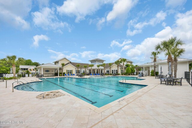 1961 Indigo Cove Way, Calabash, NC 28467 - community pool featuring a patio and fence