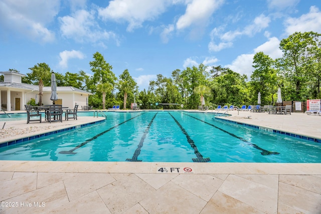 1961 Indigo Cove Way, Calabash, NC 28467 - community pool featuring a patio area