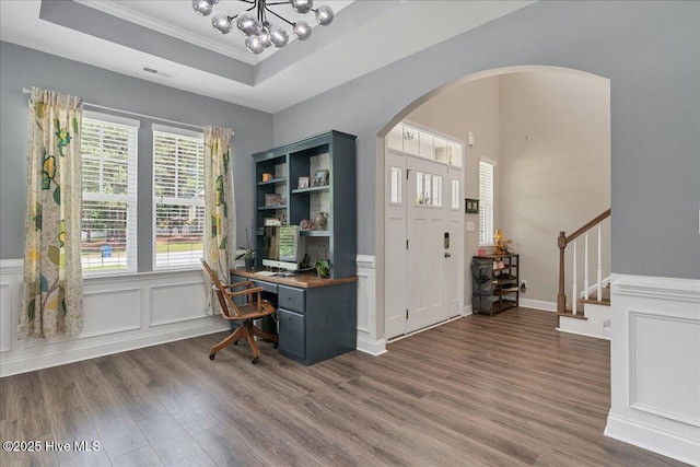 145 Cabin Branch Dr, Carthage, NC 28327 - office featuring arched walkways, wood finished floors, a chandelier, a raised ceiling, and crown molding