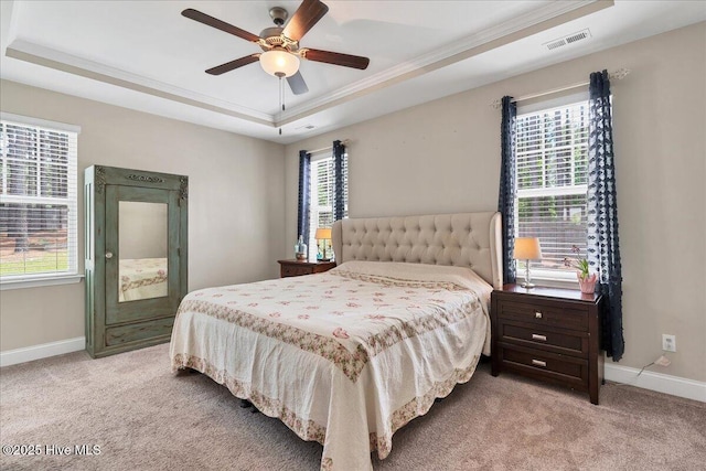 145 Cabin Branch Dr, Carthage, NC 28327 - bedroom with a raised ceiling, light colored carpet, ornamental molding, baseboards, and a ceiling fan