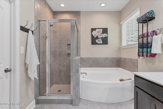 145 Cabin Branch Dr, Carthage, NC 28327 - full bath featuring a shower stall, a bath, tile patterned flooring, vanity, and recessed lighting