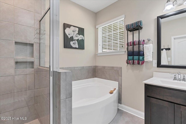 145 Cabin Branch Dr, Carthage, NC 28327 - bathroom with a stall shower, a bath, vanity, and baseboards