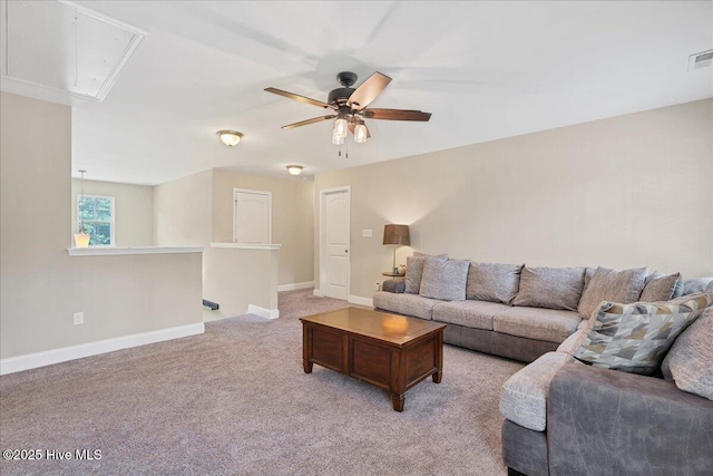 145 Cabin Branch Dr, Carthage, NC 28327 - living area with attic access, ceiling fan, light colored carpet, and baseboards