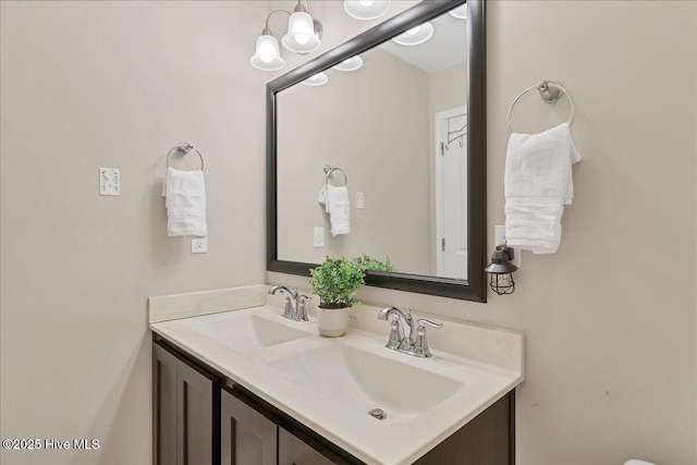 145 Cabin Branch Dr, Carthage, NC 28327 - bathroom with double vanity and a chandelier