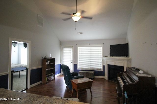 2208 Sweet Bay Dr Unit A, Greenville, NC 27834 - living room with a ceiling fan, vaulted ceiling, wood finished floors, a fireplace, and baseboards