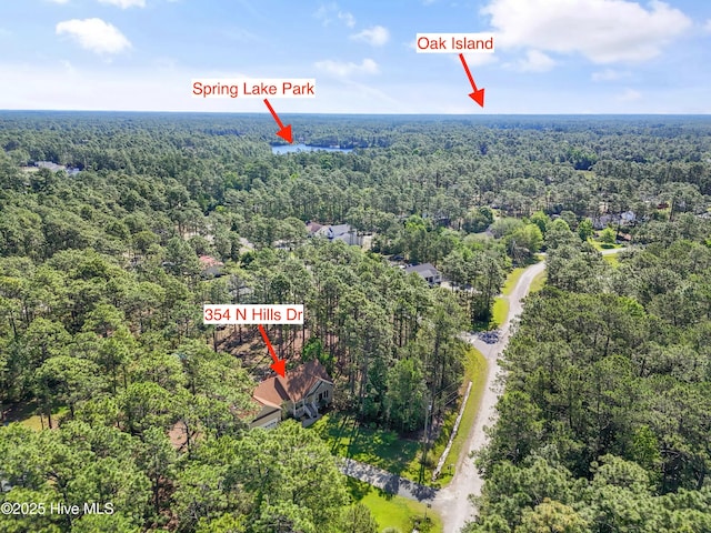 354 N Hills Dr, Southport, NC 28461 - view of property location with a heavily wooded area
