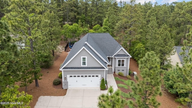125 Steeplechase Way, Southern Pines, NC 28387 - view from above of property with a forest