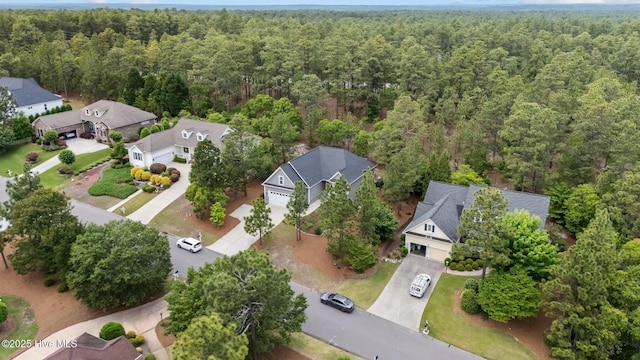 125 Steeplechase Way, Southern Pines, NC 28387 - aerial view of residential area with a heavily wooded area