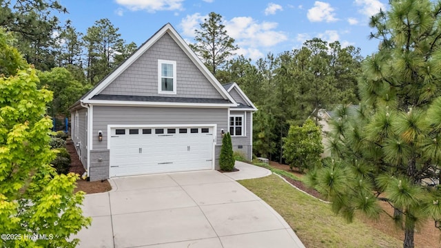 125 Steeplechase Way, Southern Pines, NC 28387 - view of front facade with driveway, a front yard, view of scattered trees, and crawl space