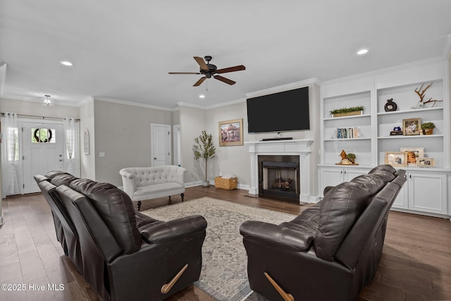 125 Steeplechase Way, Southern Pines, NC 28387 - living room with a ceiling fan, wood finished floors, crown molding, a fireplace with flush hearth, and recessed lighting