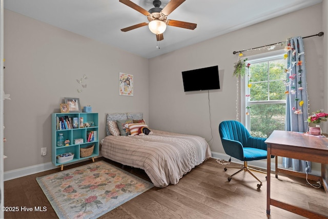 125 Steeplechase Way, Southern Pines, NC 28387 - bedroom featuring baseboards, wood finished floors, and ceiling fan