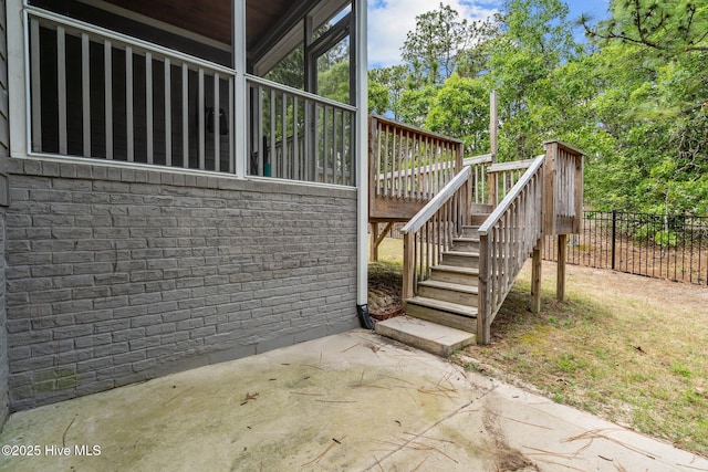 125 Steeplechase Way, Southern Pines, NC 28387 - view of side of property featuring stairway, fence, a patio area, and a wooden deck