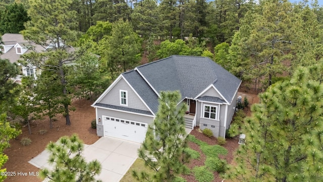 125 Steeplechase Way, Southern Pines, NC 28387 - view from above of property featuring a heavily wooded area