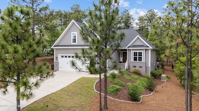 125 Steeplechase Way, Southern Pines, NC 28387 - view of front of house with concrete driveway, a front lawn, and a shingled roof
