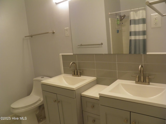 bathroom with tasteful backsplash, toilet, two vanities, and curtained shower