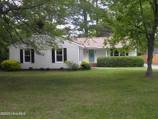 view of front facade with a front lawn