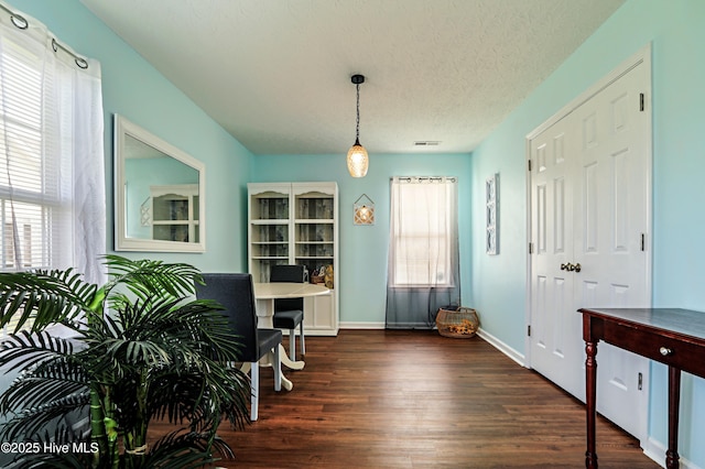 229 Red Carnation Dr, Holly Ridge, NC 28445 - dining space featuring wood finished floors, an office area, baseboards, and a textured ceiling